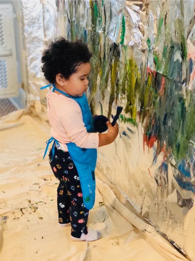kid painting in in-home daycare
